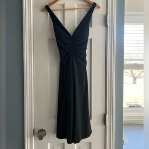 White House Black Market- size 2 Black dress with criss cross back. Worn once!